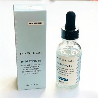 MOISTURE-ENHANCING FLUID WITH HIGH CONCENTRATIONS OF HYALURONIC ACID AND VITAMIN B5
